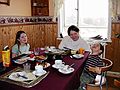 March 21, 2004 - Vogar, Iceland.<br />Dagbjrt, Inga, and Gujn enjoying Inga's birthday cake.