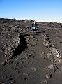 March 22, 2004 - Between Reykjanes and Hafnir on the end of Suurnes, Iceland.<br />Eric and the remains of a lava tube filled with sand.
