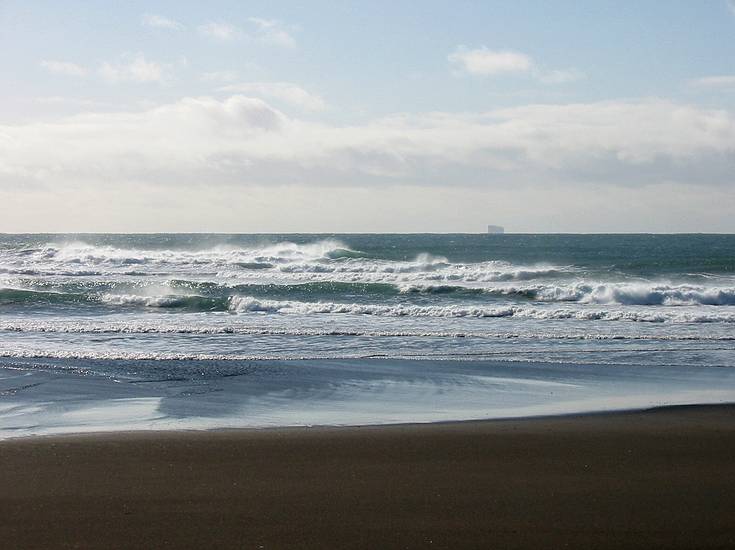 March 22, 2004 - Between Reykjanes and Hafnir on the end of Suurnes, Iceland.<br />Beach in Stra-Sandvk bay. Eldey Island can be seen on the horizon.