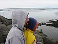 March 23, 2004 - Vogar, Iceland.<br />A walk around town where Eric, Inga, Dagbjrt, and Gujn live.<br />Eric and Gujn sitting on the breakwater.