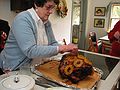 April 11, 2004 - Tewksbury, Massachusetts.<br />Easter dinner at Paul and Norma's.<br />Laura, Paul's sister, removing the pineapple from the ham.