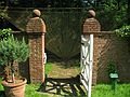 May 22, 2004 - Evergreen House, Baltimore, Maryland.<br />Sylvia Benitez, "Sleeping Beaty", 2004;<br />baling twine, wire, metal, and vine; 16' x 30' x 5'.