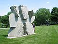 May 25, 2004 - Grounds for Sculpture, Hamilton, New Jersey.<br />Ernest Shaw, "Sumo", 1994;<br />Blue Mountain granite; 136" x 164" x 48".