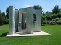 May 25, 2004 - Grounds for Sculpture, Hamilton, New Jersey.<br />Strong-Cuevas, "Arch II, Set II", 1995.<br />Joyce (to show scale). Three units of "Arch II", meeting at one end.