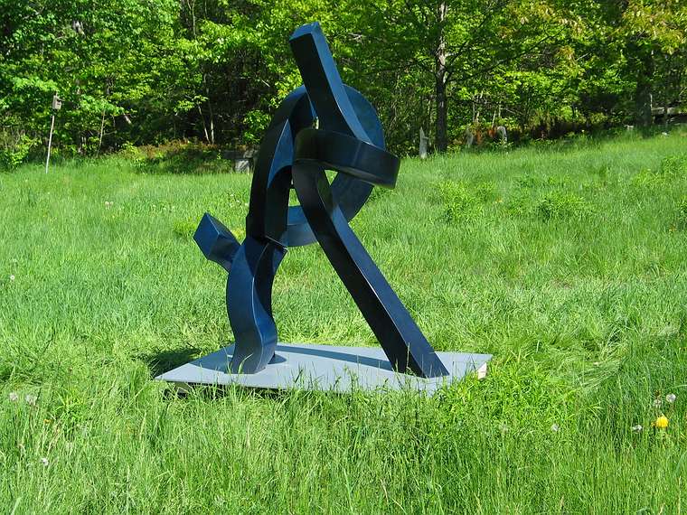 May 27, 2004 - June LaCombe/SCULPTURE at Hawk Ridge, Pownal, Maine.<br />Guy (Chip) Williams, "Figurative Abstraction"; bronze, fabricated bronze plate; $25000.