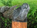 June 2, 2004 - June LaCombe/SCULPTURE at Hawk Ridge, Pownal, Maine.<br />Opening Reception.<br />Lise Becu, "Owl"; black granite; $2000.