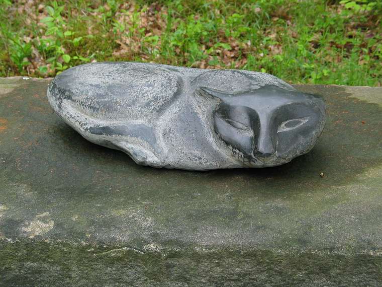 June 2, 2004 - June LaCombe/SCULPTURE at Hawk Ridge, Pownal, Maine.<br />Opening Reception.<br />Lise Becu, "Cat"; black granite; $1800.