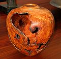 June 2, 2004 - June LaCombe/SCULPTURE at Hawk Ridge, Pownal, Maine.<br />Opening Reception.<br />Peter Asselyn, "Paradise Lost"; cherry burl; $960.