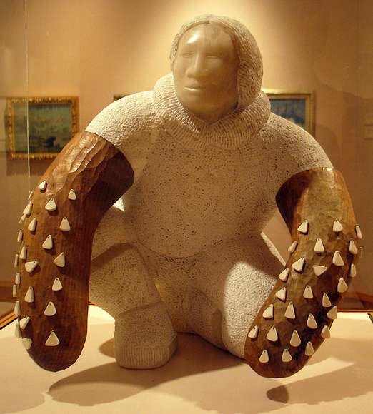 June 10, 2004 - Anchorage, Alaska.<br />Anchorage Museum of History and Art.<br />Lawrence Ullaqq Ahvakana, "Waiting for the Wolf Dance", 1949, alabaster, walnut, walrus ivory and metal.