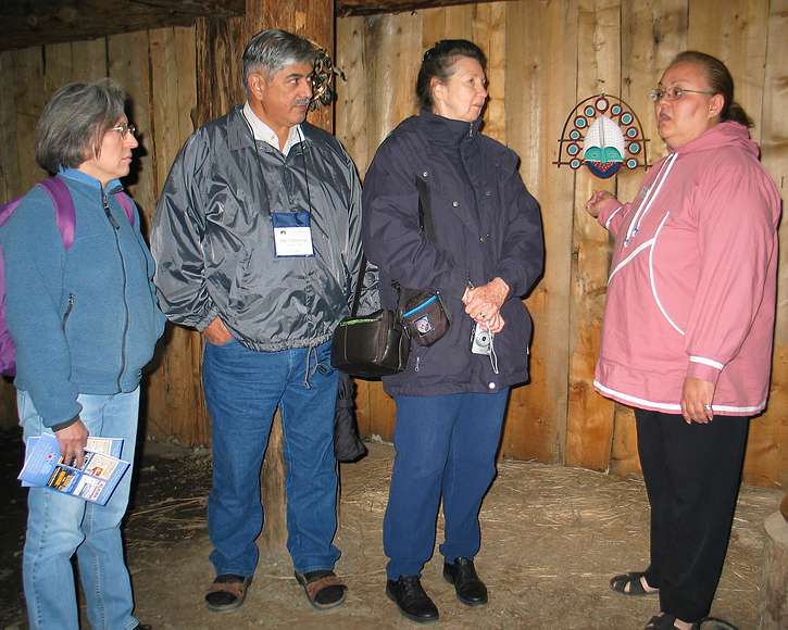 June 11, 2004 - Anchorage, Alaska.<br />Alaska Native Heritage Center.<br />Joyce, Joe and June Villarreal, and native interpreter.