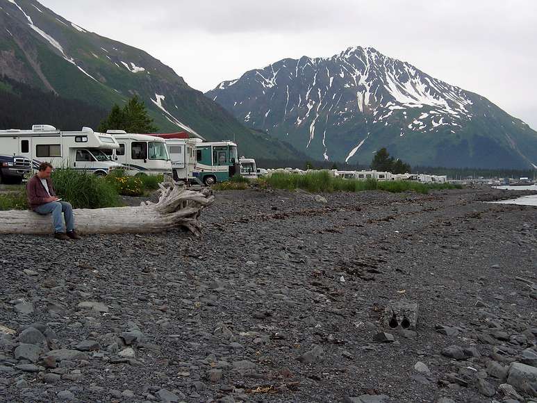 June 12, 2004 - Seward, Alaska.<br />A mile long contemporary fish camp. Each camper has a fireplace and the beach<br />was strewn with the remains of many salmon.