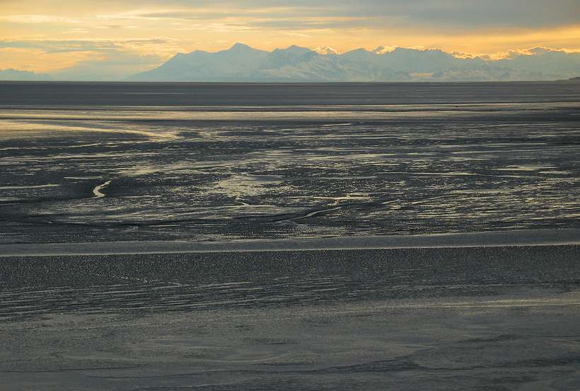 June 12, 2004 - Between Seward and Anchorage, Alaska.<br />Cook Inlet at low tide. The glacial silt is so fine here that it acts like quicksand.<br />It is dangerous.