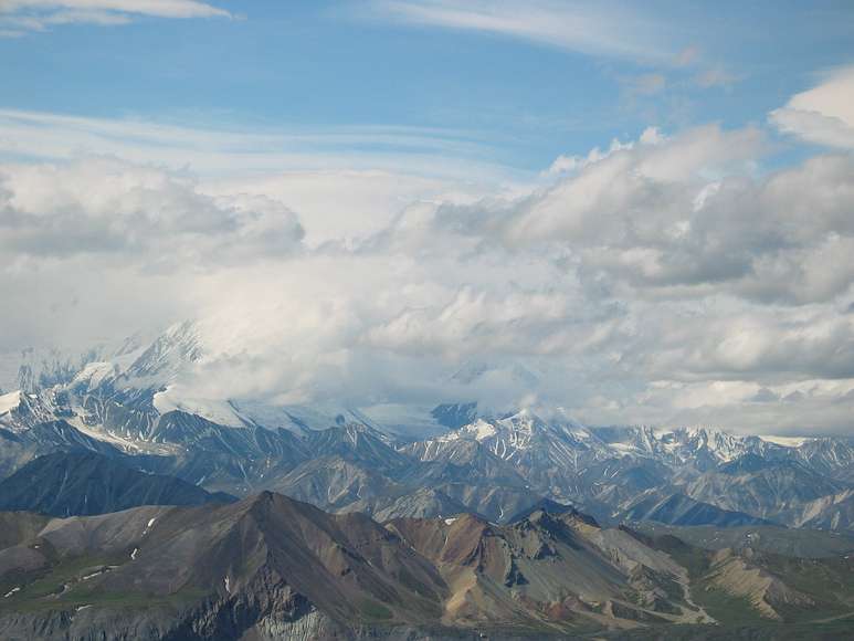 June 15, 2004 - Denali National Park, Alaska.<br />Thoro Ridge above Eielson Visitor Center.<br />Mt. Denali (Mt. McKinley) in its own weather.