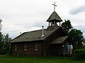 June 16, 2004 - Nenana, Alaska.<br />Jim and Carol Buquo posing in front of the local church.
