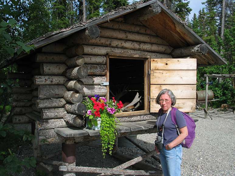 June 17, 2004 - Fairbanks, Alaska.<br />River boat trip on the Chena and Tanana Rivers.<br />Joyce in a replica of an Athabascan village along the Tanana River.