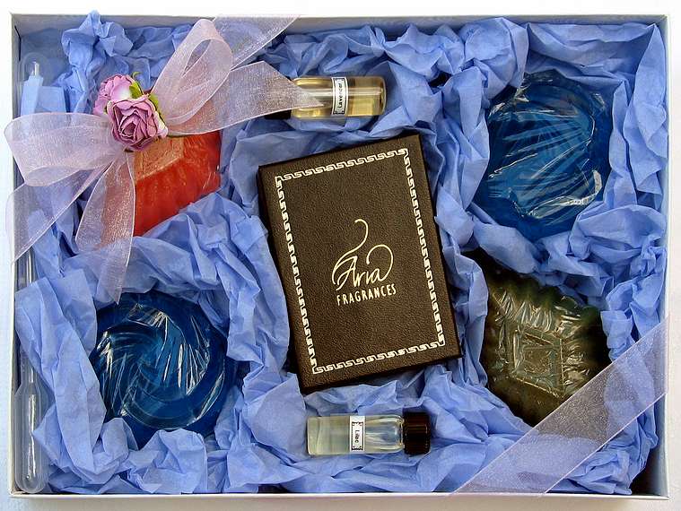 July 17, 2004 - At Memere Marie's in Lawrence, Massachusetts.<br />Holly's and Marissa's birthday celebration.<br />Holly's perfume and soap package as present for Marissa.