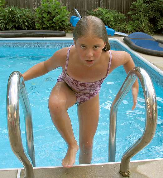 July 17, 2004 - At Memere Marie's in Lawrence, Massachusetts.<br />Holly's and Marissa's birthday celebration.<br />Marissa.
