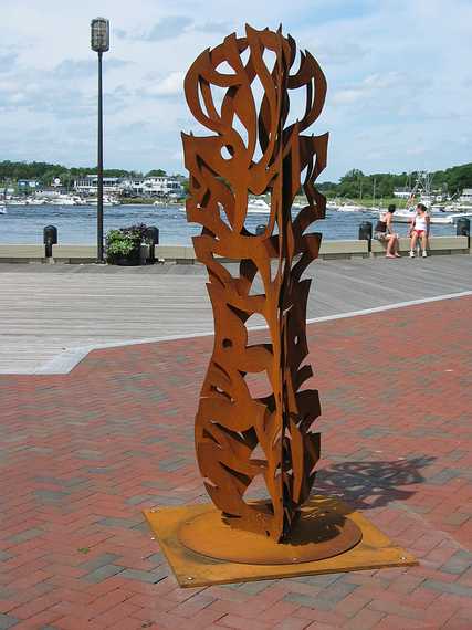 July 31, 2004 - Newburyport, Massachusetts.<br />Somerby's Landing Sculpture Show 2004/05 reception.<br />Elizabeth Van - Artifact Flame - welded steel, 84"x24"x24".