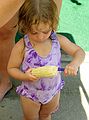 August 2, 2004 - Lawrence, Massachusetts.<br />Family get-together to see Melody, who was visiting from California.<br />Miranda brushing the hair out of the corn.