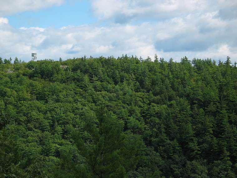 Sept. 19, 2004 - Pawtuckaway State Park, New Hampshire.<br />Fire tower atop South Mountain from atop Middle Mountain.
