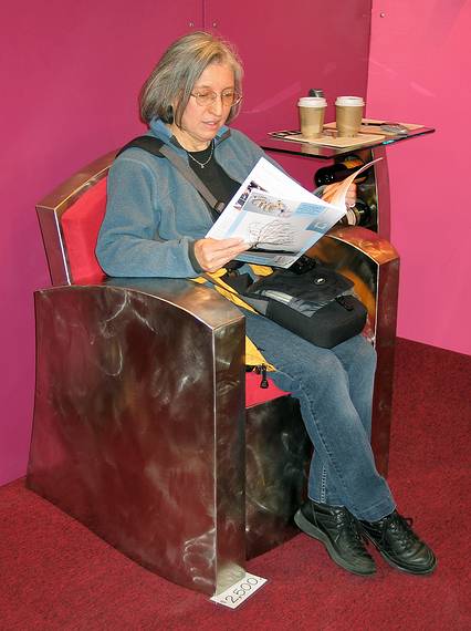 March 19, 2005 - Marlborough, Massachusetts.<br />Paradise City Arts and Crafts Show at the Royal Plaza Trade Center.<br />Joyce in Dale Rogers' stainless steel chair.