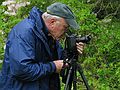 May 17, 2005 - Maudslay State Park, Newburyport, Massachusetts.<br />John Geesink photographing the azalea.