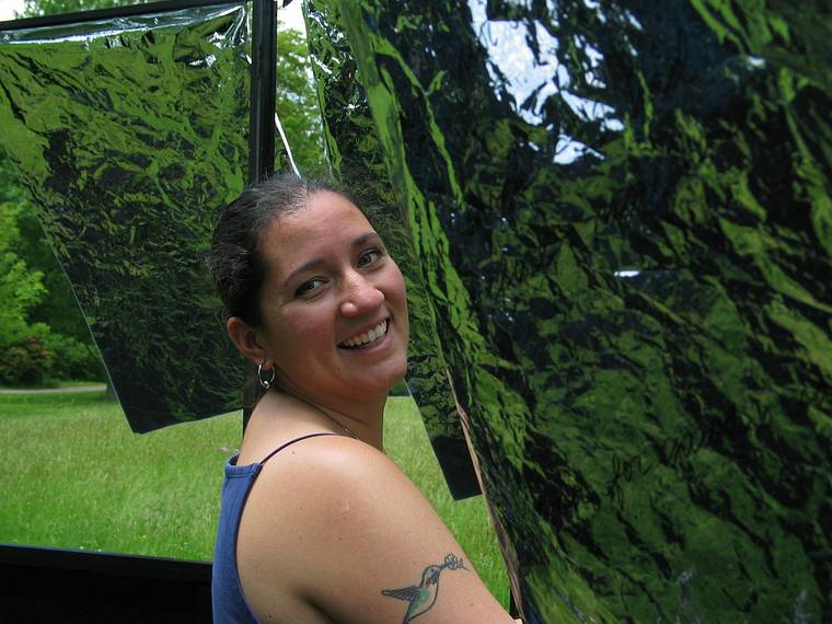 June 10, 2005 - Maudslay State Park, Newburyport, Massachusetts.<br />Melody helping Joyce fix her "Mama says ..." installation after a storm.