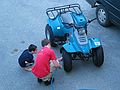 June 21 - AtTom and Kim's in South Hampton, New Hampshire.<br />Gujn watching Michael pump up the tires.