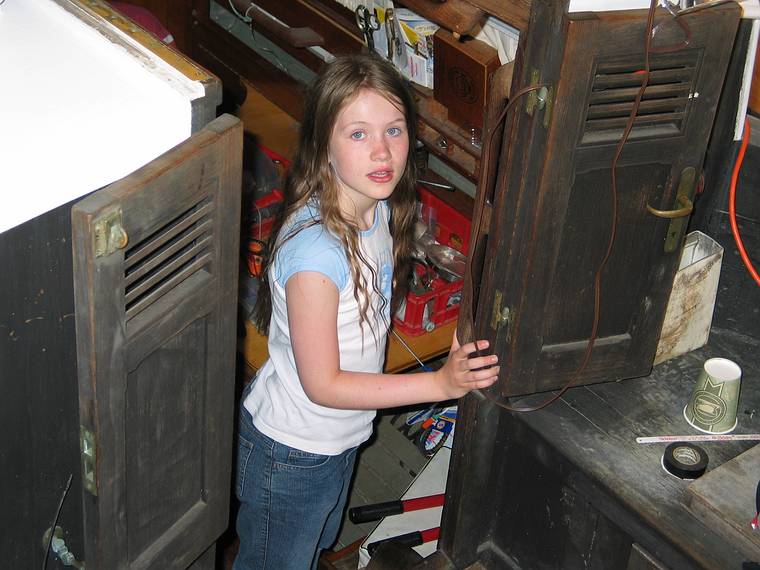 June 23, 2005 - Chappaquiddick Island, Marthas Vinyard, Massachusetts.<br />At Hanleys house.<br />Dagbjrt aboard Hanley's wooden sail boat inside the house.