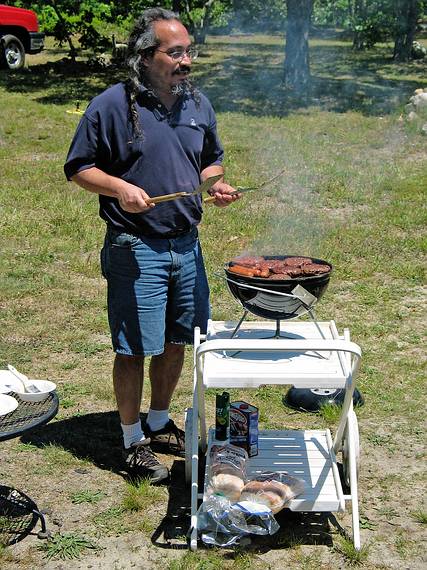 June 23, 2005 - Chappaquiddick Island, Marthas Vinyard, Massachusetts.<br />On Holly's grandmother's property.<br />Carl doing the cooking? (He did an excellent job with the chicken and hot dogs.)