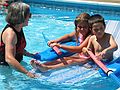 July 10, 2005 - At Marie's in Lawrence, Massachusetts.<br />Gujns 5th birthday celebration.<br />Joyce, Marissa, and Gujn.