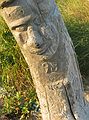 August 7, 2005 - Hermit Island, Small Point, Maine.<br />Carving on a driftlog on Head Beach.