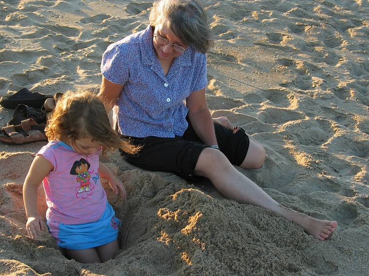August 27, 2005 - Parker River National Wildlife Refuge, Plum Island, Massachusetts.<br />Miranda and Joyce dug a deep hole.