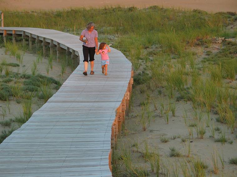 August 27, 2005 - Parker River National Wildlife Refuge, Plum Island, Massachusetts.<br />Joyce and Miranda heading for the car in lot #3.