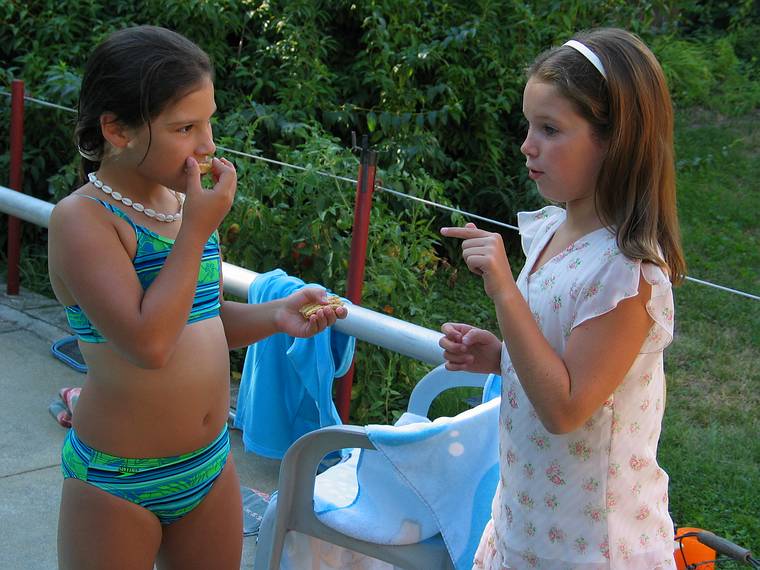 September 3, 2005 - Lawrence, Massachusetts.<br />Another family gathering at Memere Marie's pool on a hot summer day.<br />Arianna and Kylie, Paul's sister Laura's son Jay R.'s daughter.