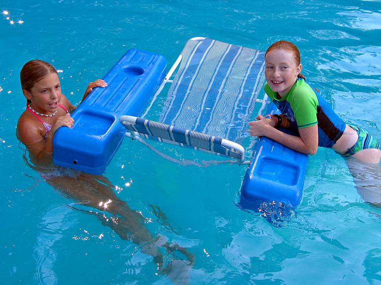 September 3, 2005 - Lawrence, Massachusetts.<br />Another family gathering at Memere Marie's pool on a hot summer day.<br />Marissa and her friend.