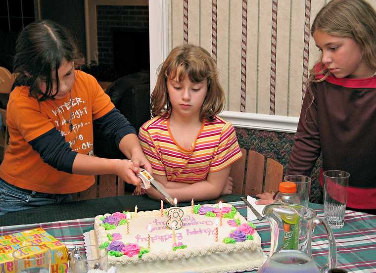 Arianna cutting her own birthday cake while Ashley and Marissa watch.<br />Arianna's 8th birthday party continued.<br />November 5, 2005 - South Hampton, New Hampshire.