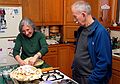 Ronnie watching Joyce prepare her apple pie.<br />Dec. 24, 2005 - Merrimac, Massachusetts.