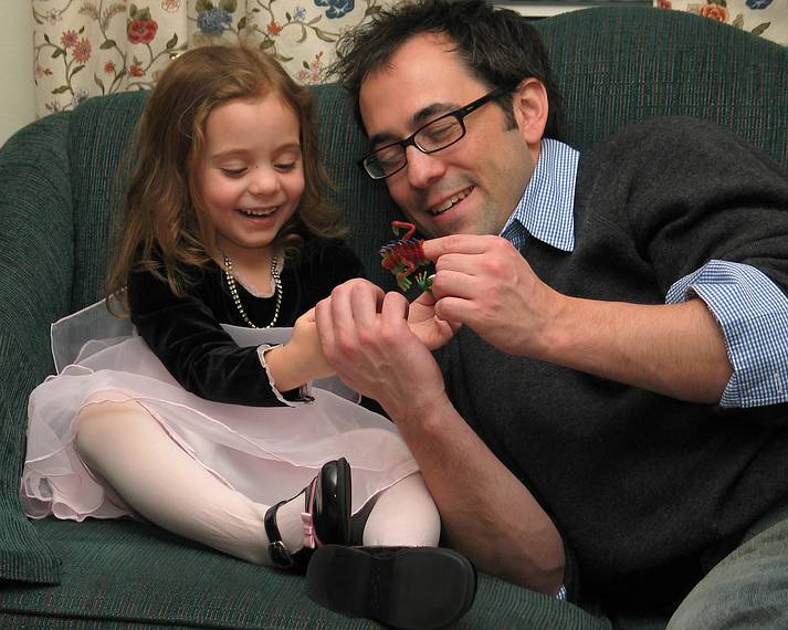 Miranda and Julian playing with finger puppets.<br />Dec. 25, 2005 - Merrimac, Massachusetts.