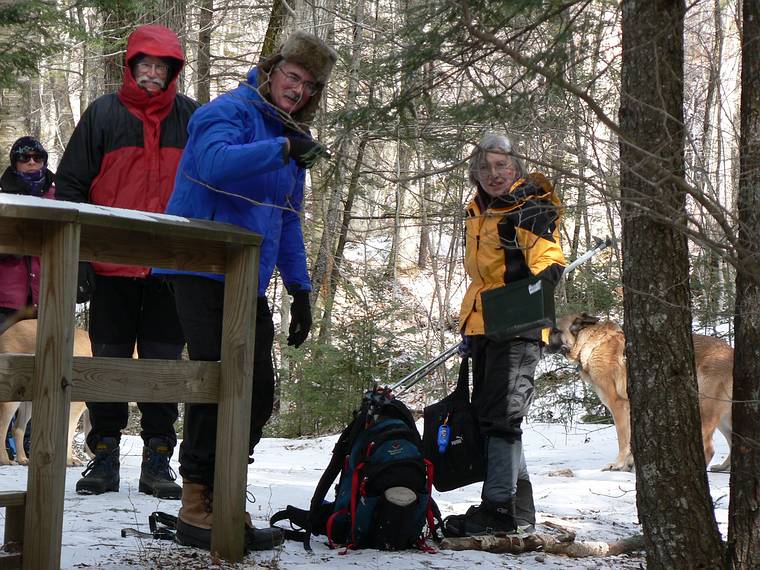 Feb. 18, 2006 - Off Rt. 49 in the White Mountains, New Hampshire.<br />Nancy, Bill, John, and Joyce with the geocache ammo box.