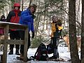 Feb. 18, 2006 - Off Rt. 49 in the White Mountains, New Hampshire.<br />Nancy, Bill, John, and Joyce with the geocache ammo box.