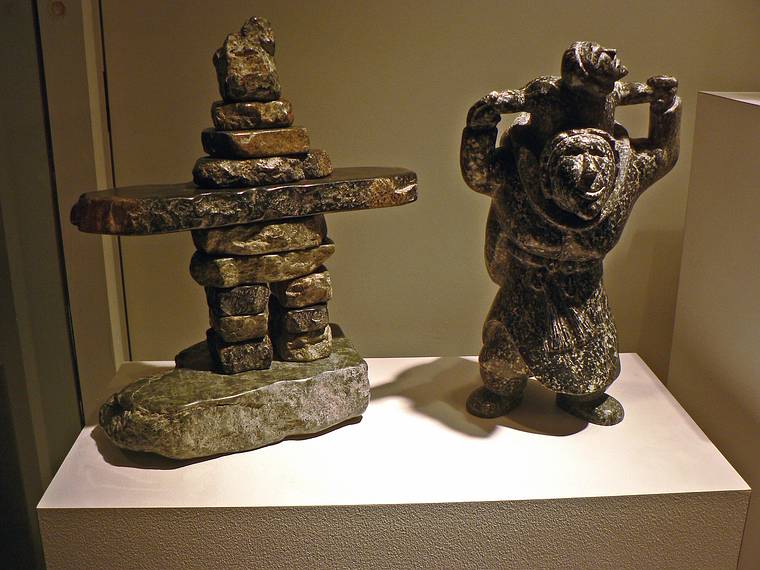 April 14, 2006 - Quebec City, Quebec, Canada.<br />Inuit sculptures on display in a downtown shop on Rue St. Louis.