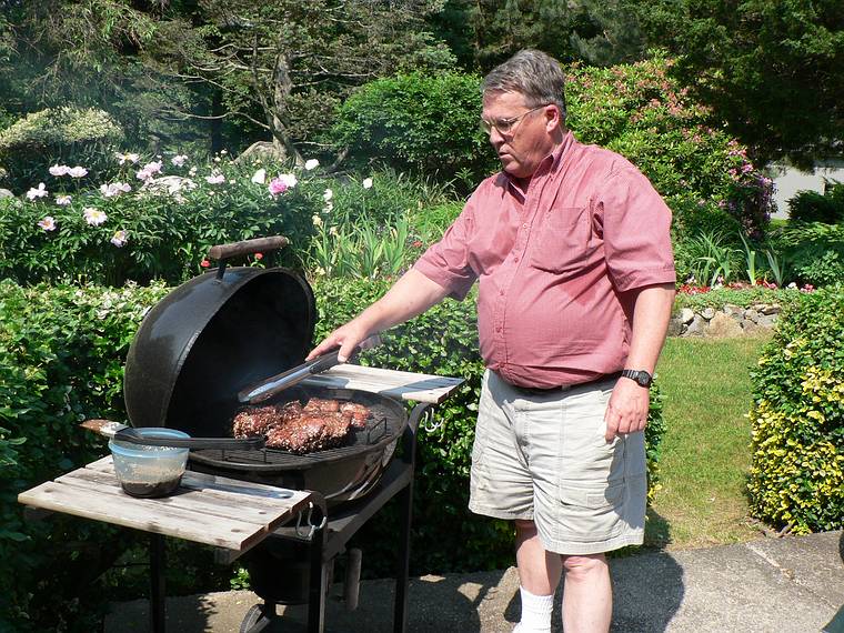 June 18, 2006 - Manchester by the Sea, Massachusetts.<br />Eriks' 13th birthday.<br />Uldis broiling lamb.