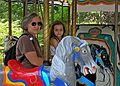 July 10, 2006 - Southwick's Zoo, Mendon, Massachusetts.<br />Joyce and Miranda on a merry-go-round.