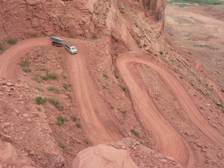 August 12, 2006 - Mineral Bottom, Green River (the river, not the town), Utah.<br />We had to walk down the switchbacks while the van carried our equipment and canoes.<br />If it had rained, we would not have been able to descend this road.