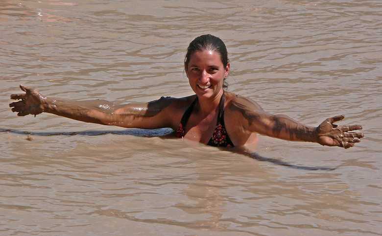 August 13, 2006 - Day 2 on the Green River, Utah.<br />Melody taking a mud bath.