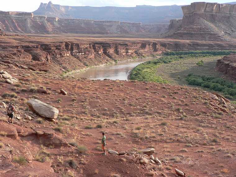 August 13, 2006 - Day 2 on the Green River, Utah.<br />A walk around the base of Turks Head.<br />Brad and Sati and a portion of the river we canoed a few hours ago.