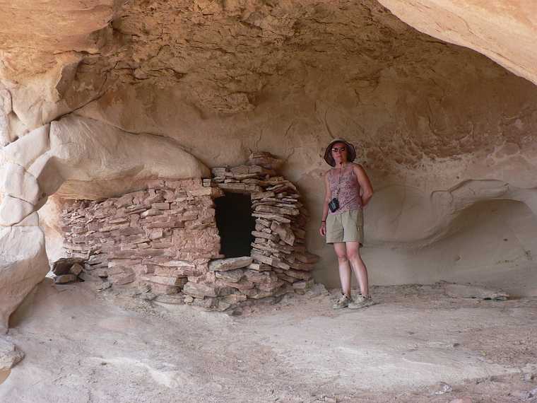 August 17, 2006 - Island in the Sky, Canyonlands National Park, Utah.<br />Anasazi granary and Joyce at Aztec Butte.
