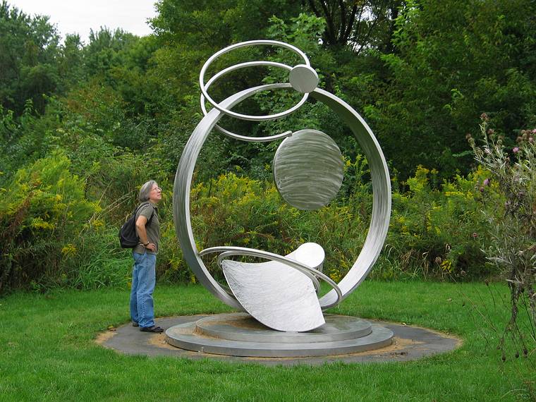 Sept. 18, 2006 - Urbana, Illinois.<br />Wandell Sculpture Garden at Meadowbrook Park.<br />Joyce admiring Christiane T. Martens' "Molecular Reflection", 1997, stainless steel.
