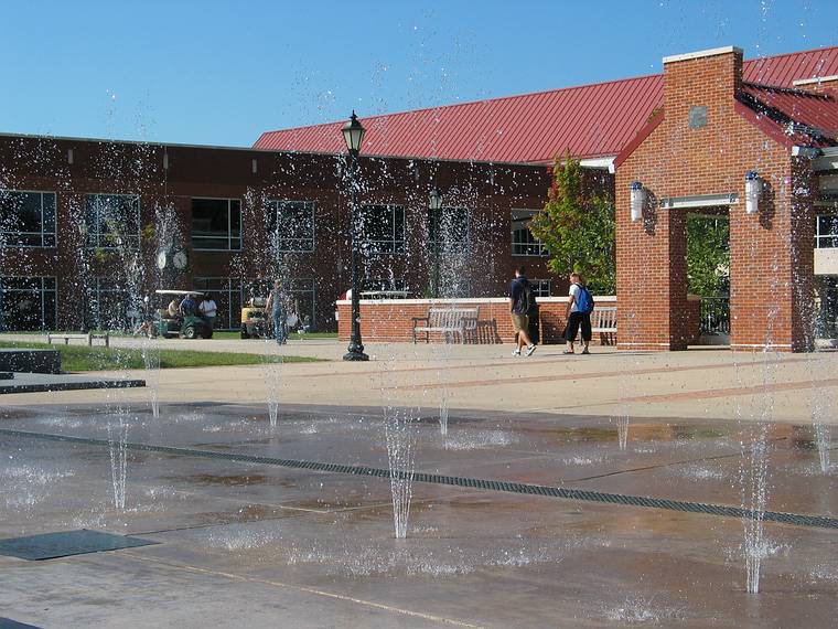Sept. 20, 2006 - Longwood University, Farmville, Virginia.<br />Installation and priming of Joyce's "Strobus".<br />Library through the fountain on Brock Commons.